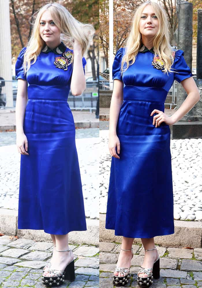 Dakota wore a slightly-creased blue dress with patchwork at the shoulder