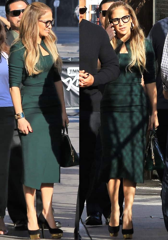 Jennifer looks low-key in a moss green dress by Roland Mouret