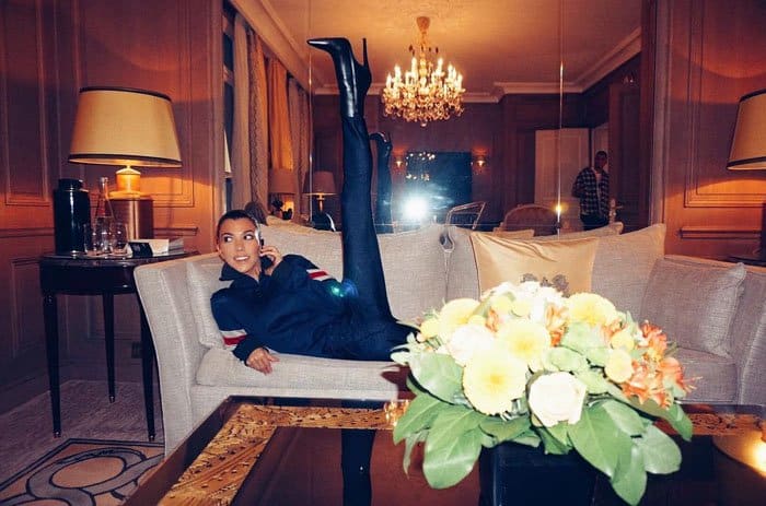 Kourtney Kardashian uploads a photo of herself in the same Balenciaga boots just days before