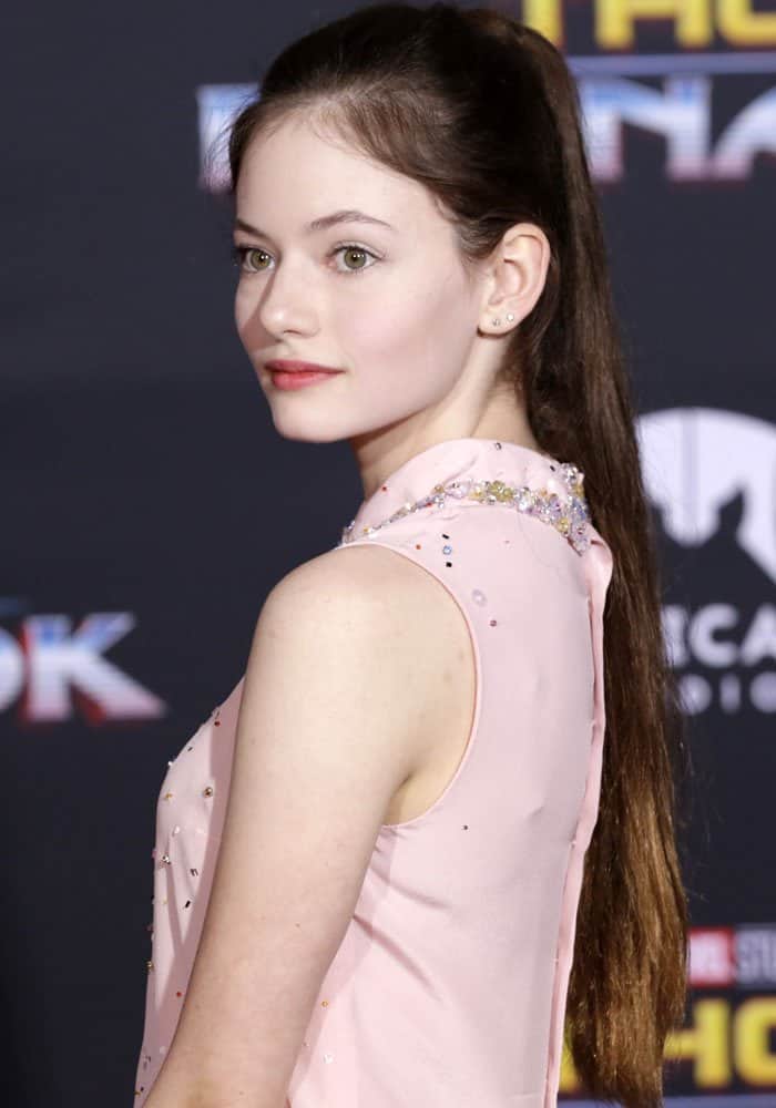 Mackenzie shows off a youthful glow in a high ponytail and rosy makeup