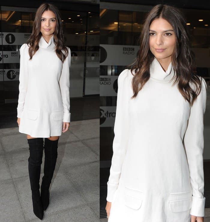 Emily Ratajkowski stuns in a white Zimmermann Esplanade crepe body dress paired with Brian Atwood Odille boots, Graziela Gems baby baguette band ring, and Ileana Makri black diamond stud earrings