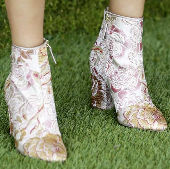 Not your typical polo shoes: Victoria picked out a pair of jacquard print "Savitra" boots from Nine West