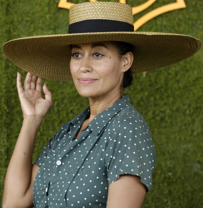 Tracee Ellis Ross wearing an Agnes B top and a wide-brimmed hat at the 8th Annual Veuve Clicquot Polo Classic