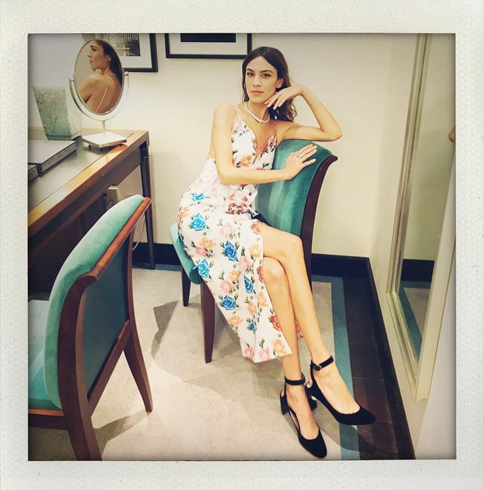 The socialite poses backstage with her Tiffany Co. jewels