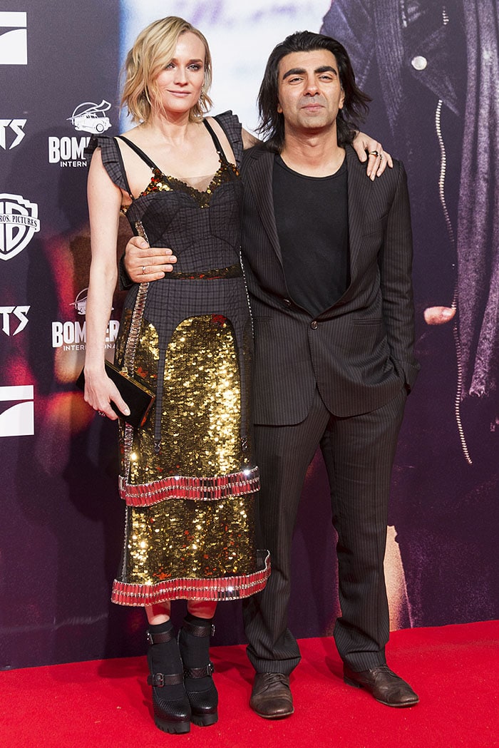 Diane Kruger posed with director Fatih Akin in a sequined Vera Wang dress and chunky double-buckled platform pumps at the Hamburg premiere of In the Fade