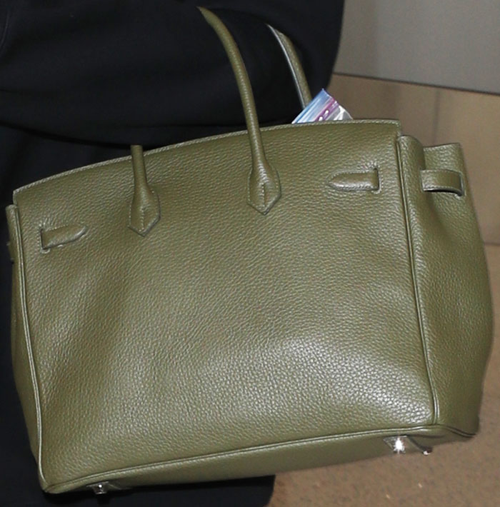 A closer look at Khloé Kardashian's iconic Hermès Birkin bag, seen here in a distinctive olive green leather