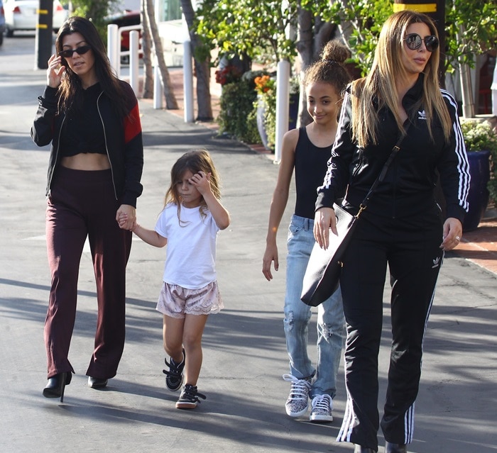 Kourtney Kardashian steps out in West Hollywood with her daughter Penelope and close friend Larsa Pippen, who was joined by her daughter Sophia, during a casual lunch and shopping outing on November 18, 2017