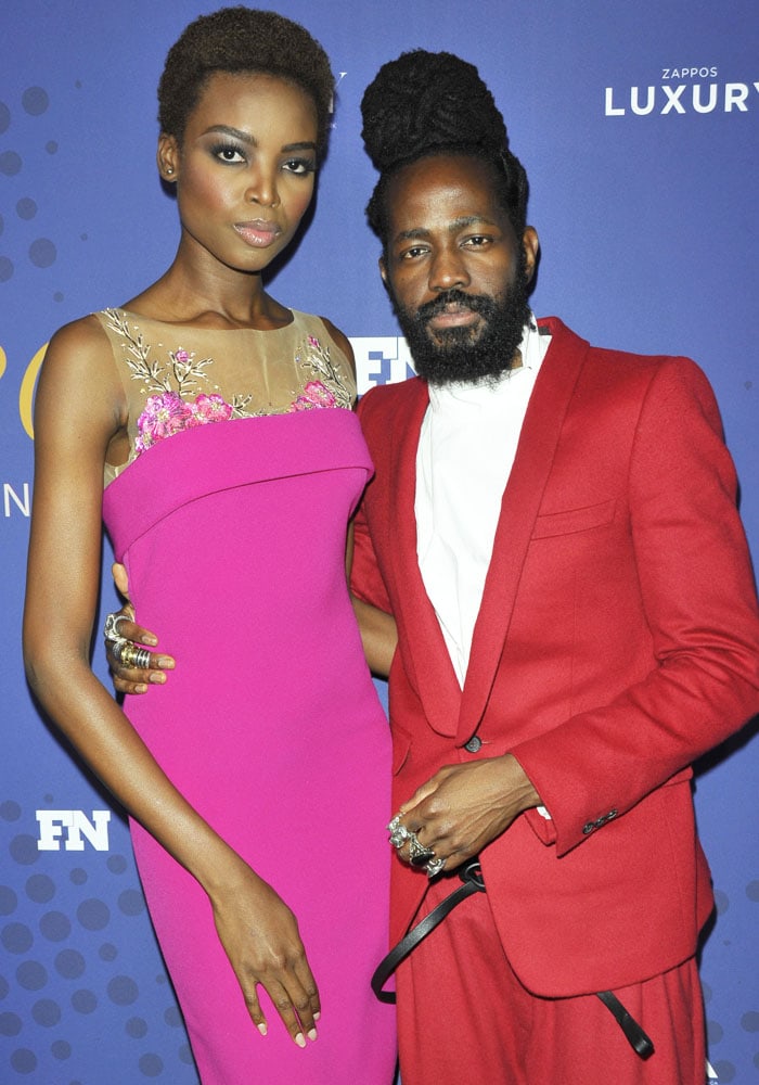 The statuesque model poses with Malone Souliers co-founder Roy Luwolt as the brand receives the Vivian Infantino Emerging Talent Award