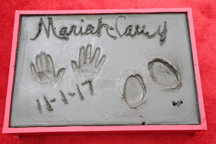 ariah signed her name and dated the cement block that will be placed outside the famed TCL Chinese Theatre (formerly Grauman’s Chinese Theatre)