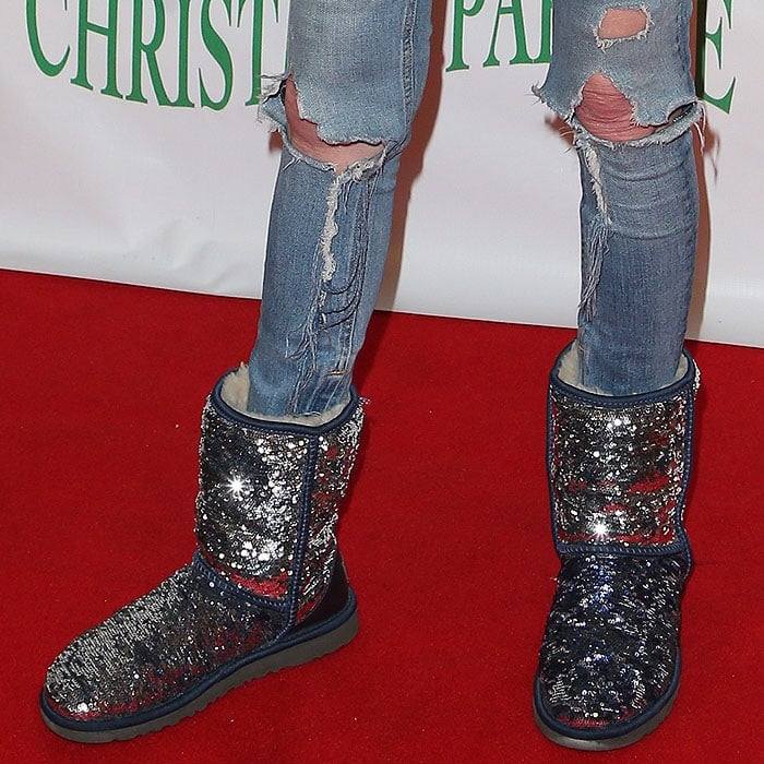 Tara Reid's UGG classic short "Sparkle" boots with double-sided blue-and-sliver sequins and cream sheepskin fleece lining