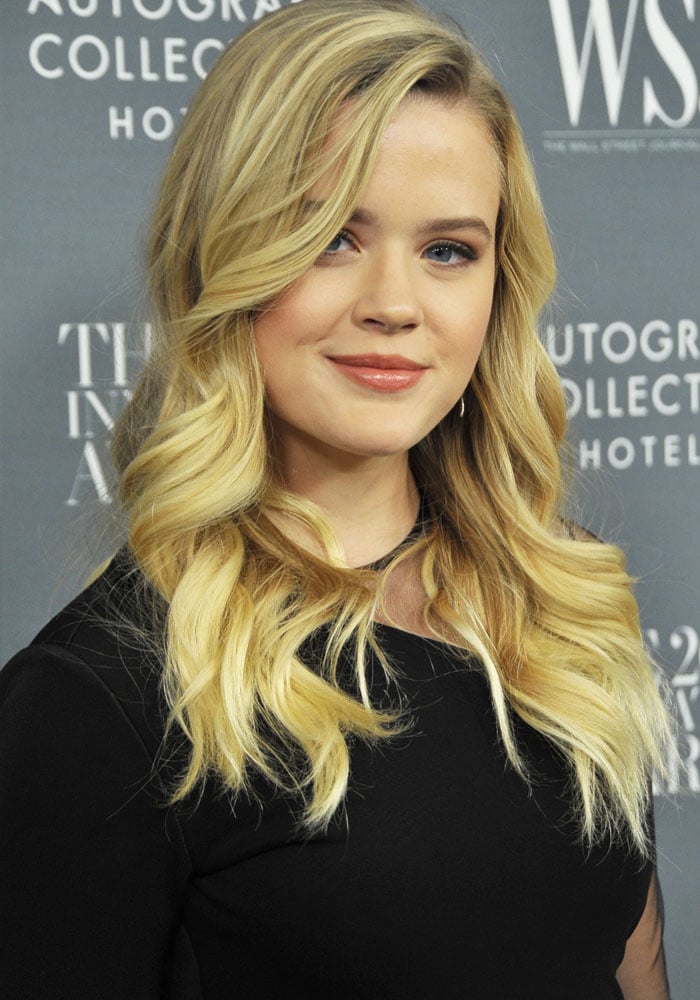 Ava Phillippe is pictured with long, wavy blonde hair and blue eyes