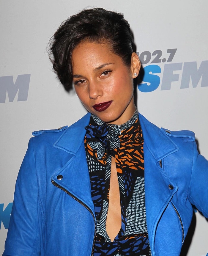 Alicia Keys wearing a light-blue leather moto jacket Alicia Keys wearing a light-blue leather moto jacket