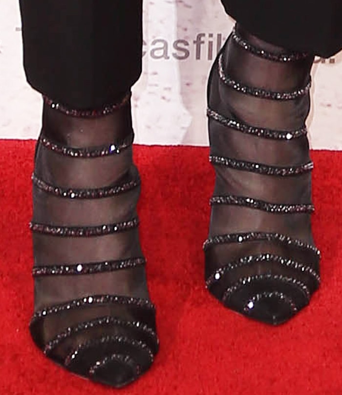 The Jimmy Choo "Belle" booties has an upper made from mesh, suede strips and sparkling studs