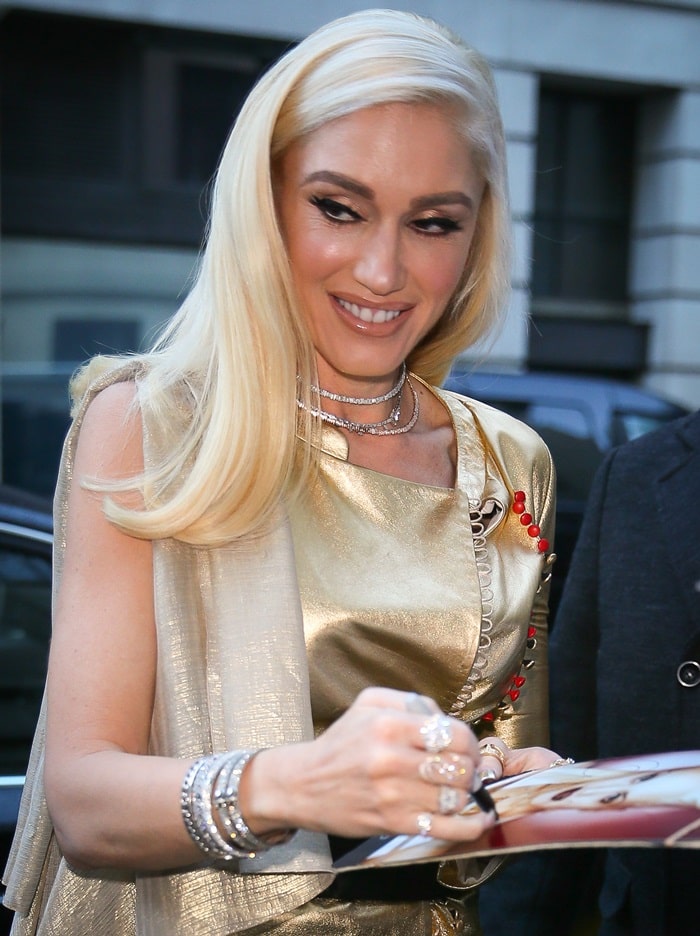 Gwen Stefani arrives at Radio 2 wearing an eye-catching yellow and gold Schiaparelli Spring 2017 Couture ensemble on December 1, 2017