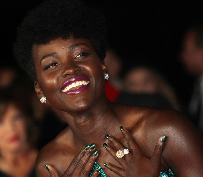 Lupita Nyong'o sports metallic makeup by Lancôme