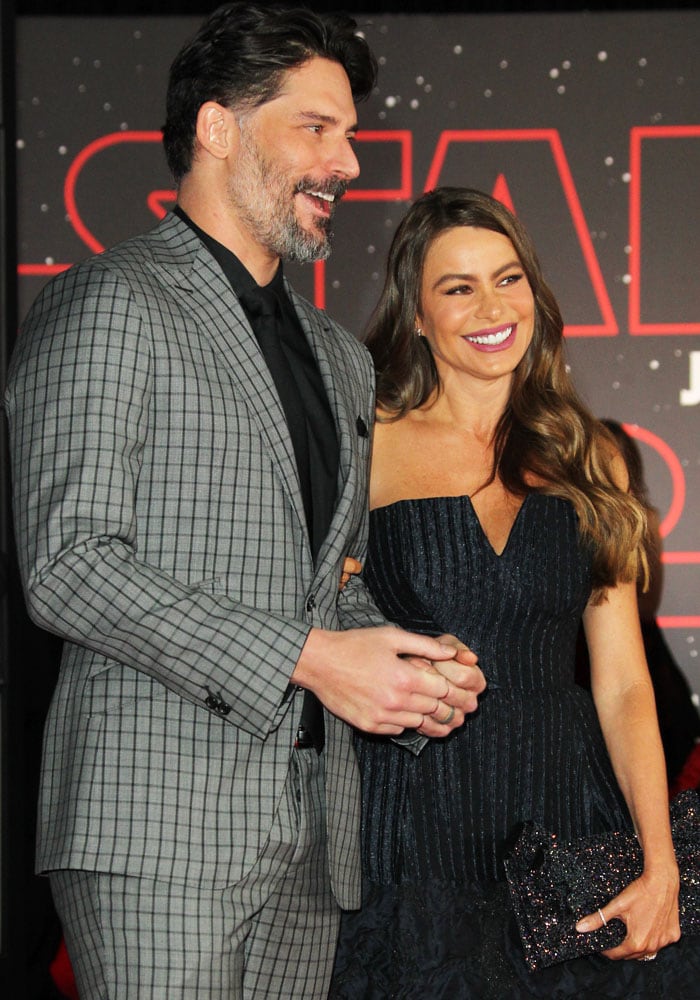 Capturing moments of glamor, the couple shines with radiance on the carpet