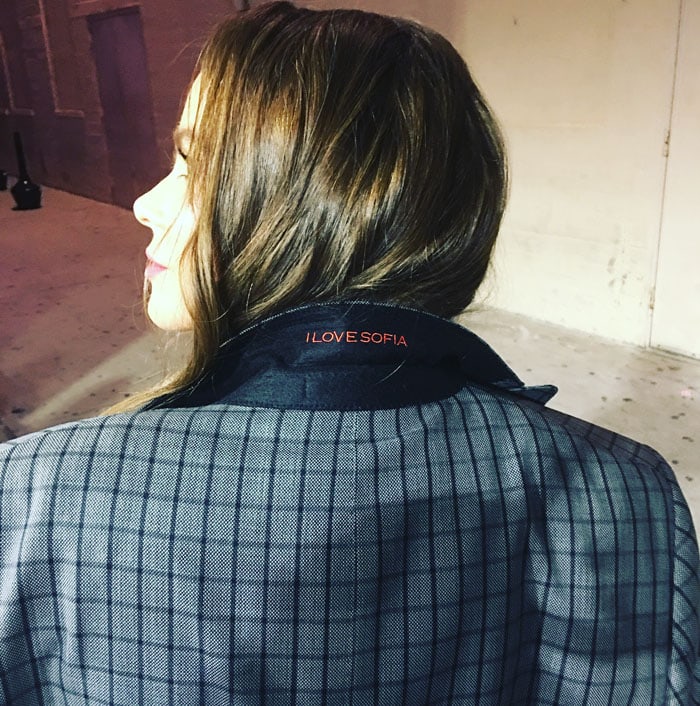 With pride and love, the actress displays her husband's suit, charmingly monogrammed with 'I Love Sofia' on the collar