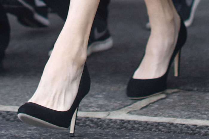 Angelina Jolie steps out in Giuseppe Zanotti’s “Annette” black suede pumps, a sleek pointed-toe pair that sharpens her all-black Paris ensemble
