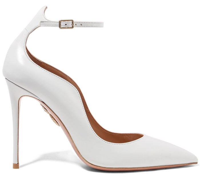 Aquazzura “Dolce Vita” white leather ankle-strap pumps with a sleek pointed toe and slender stiletto heel, originally retailing for $750