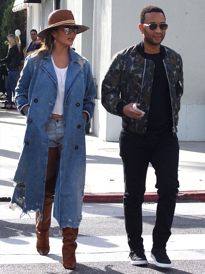 John Legend, who stands 5ft 9 (175.3 cm), appears taller than his wife Chrissy Teigen at 5ft 7 (170.2 cm) even with her Saint Laurent thigh-high boots