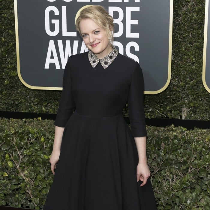 Elisabeth Moss exudes sophistication in a Dior Haute Couture dress adorned with an embellished collar