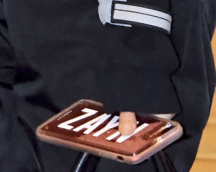 Gigi Hadid offered a glimpse of her personal style with an iPhone case emblazoned with her then-boyfriend Zayn Malik's name