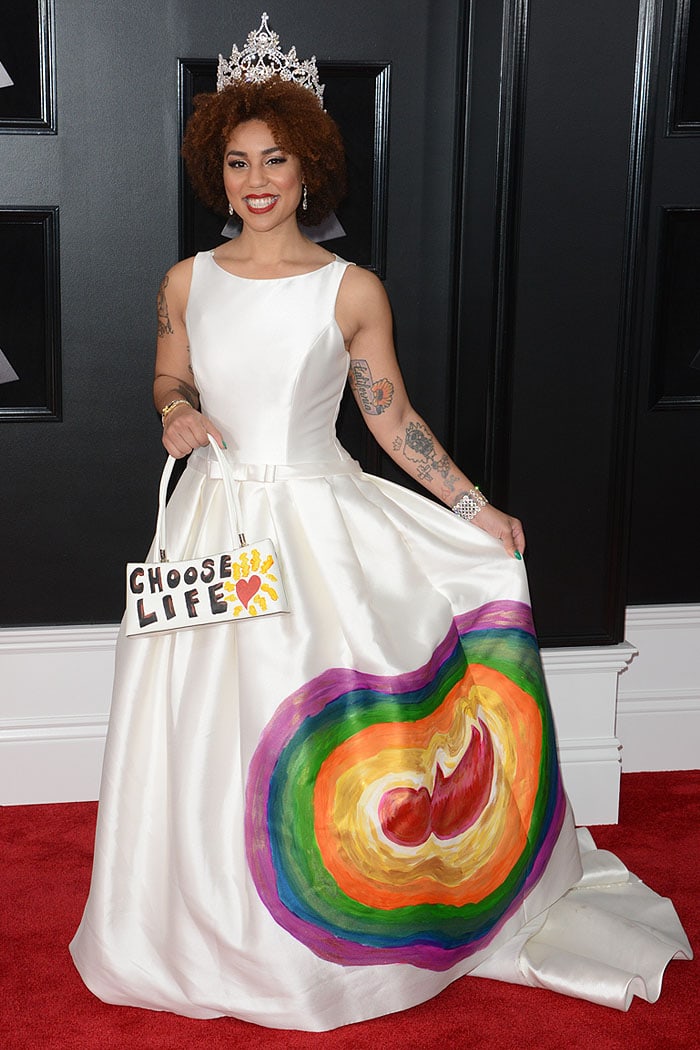 Joy Villa herself hand-painted her Pronovias sleeveless ball gown with the fetus portrait based on the sonogram of her own daughter