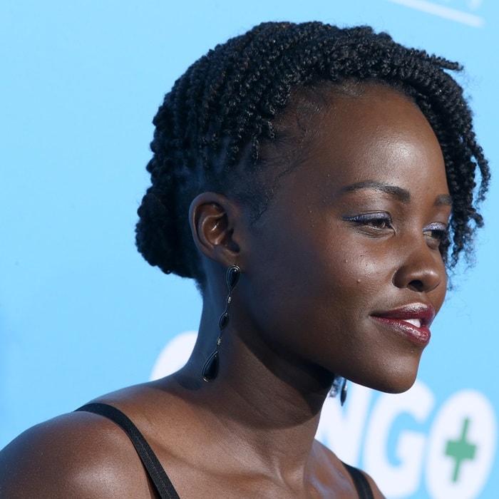 Lupita Nyong’o sported a Black Panther-inspired head full of side-swept flat twists