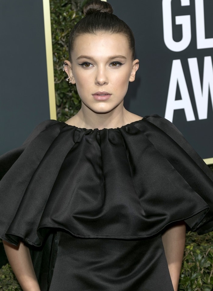 Millie Bobby Brown wearing Calvin Klein by Appointment at the 2018 Golden Globe Awards held at the Beverly Hilton Hotel in Beverly Hills, California, on January 7, 2018