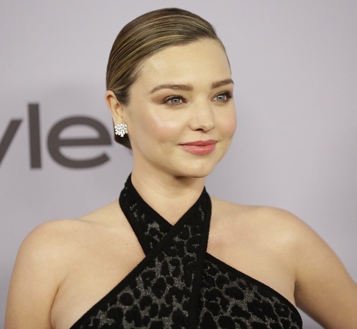 Miranda Kerr wearing a leopard-print halter Balmain dress at the 2018 Golden Globe Awards held at the Beverly Hilton Hotel in Beverly Hills, California, on January 7, 2018