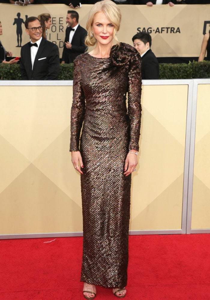 Understated yet elegant: Nicole steps on the red carpet in an Armani Privè dress