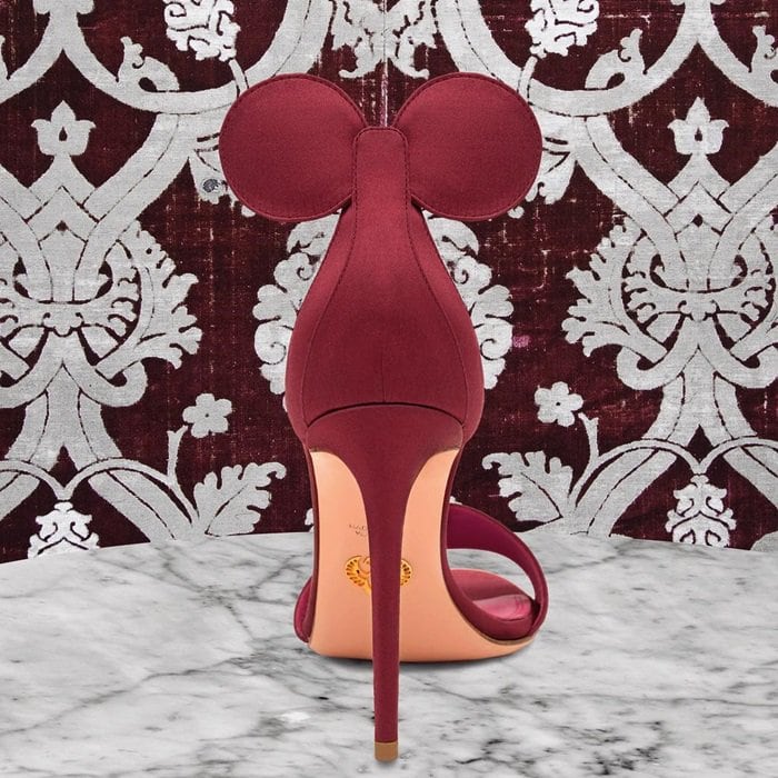 These Oscar Tiye 'Minnie' heels in a rich burgundy color feature a sleek, thin stiletto