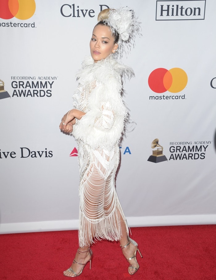 Rita Ora wearing a Zuhair Murad Fall 2017 Couture dress on the red carpet as she arrives at Clive Davis‘ annual Pre-Grammys Party in New York City on January 27, 2018