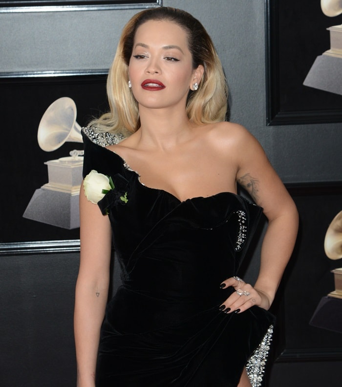 Rita Ora wearing a sultry black Ralph Russo Spring 2018 Couture gown at the 2018 Grammy Awards held at Madison Square Garden in New York City on January 28, 2018
