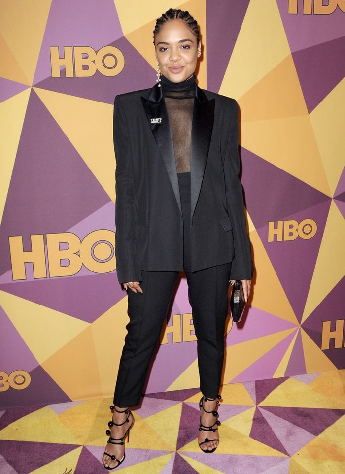 Tessa Thompson donned a menswear-inspired look from the Alexandre Vauthier Fall 2017 Couture collection consisting of a black tuxedo featuring a velvet turtleneck