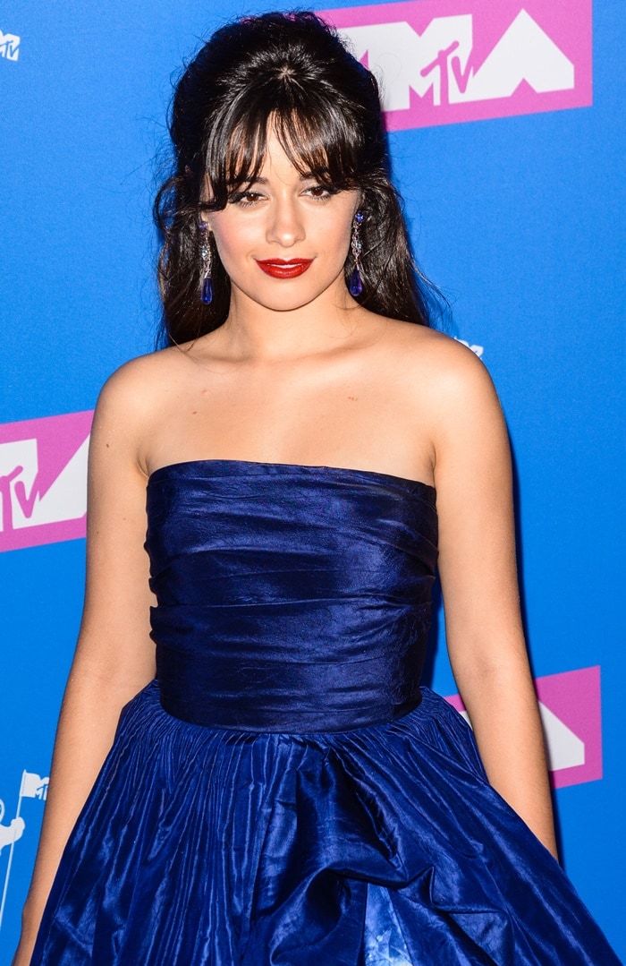 Camila Cabello in a navy halter gown from the Oscar de la Renta Resort 2019 Collection