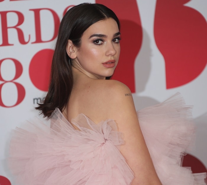 Dua Lipa wearing a Giambattista Valli Spring 2018 Couture dress at the 2018 BRIT Awards held at The O2 Arena in London, England, on February 21, 2018
