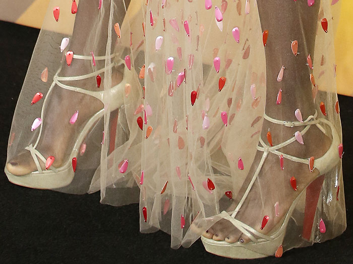 Florence Kasumba's feet in Christian Louboutin "Golden Blake" platform sandals