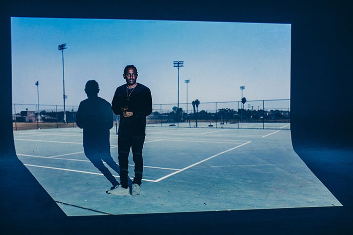 Kendrick Lamar promoting the Reebok Classic 'Club C 85 Tonal Gum' sneakers.