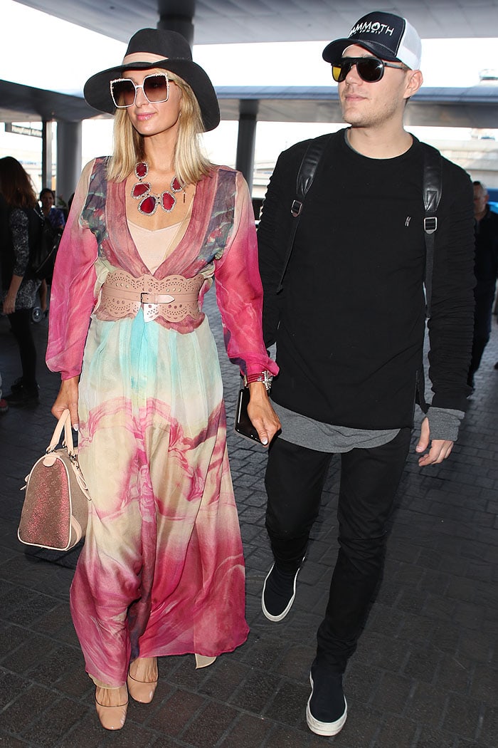 Paris Hilton and fiancé Chris Zylka departing from Los Angeles International Airport (LAX) in Los Angeles, California, on January 24, 2018.