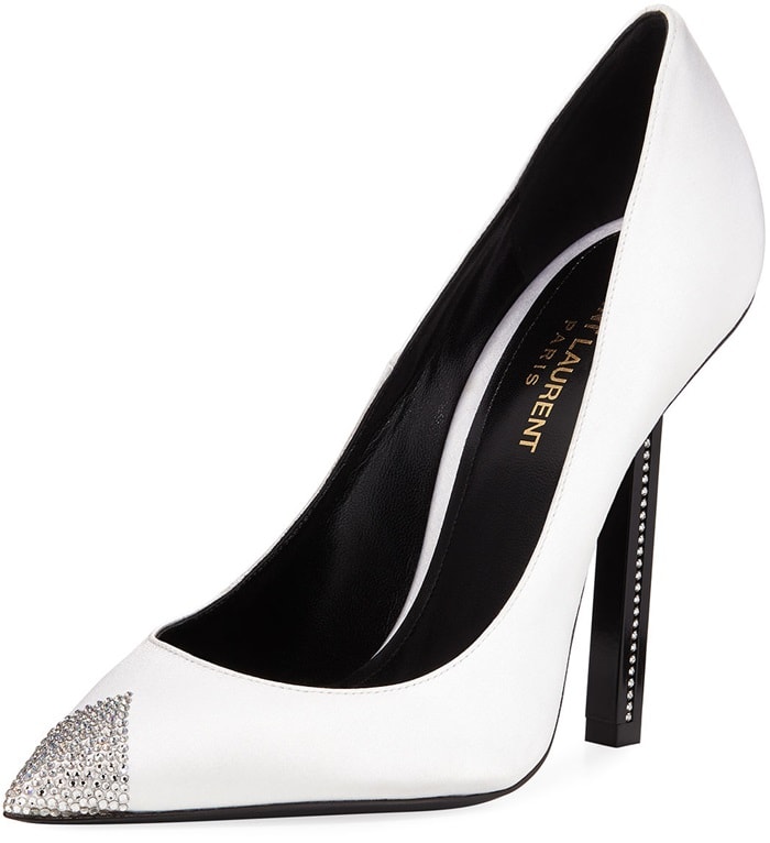 A crystal-studded inset heel adds to the sharp, modern look of a cap toe pump featuring a pointy toe embellished with an extra touch of sparkle