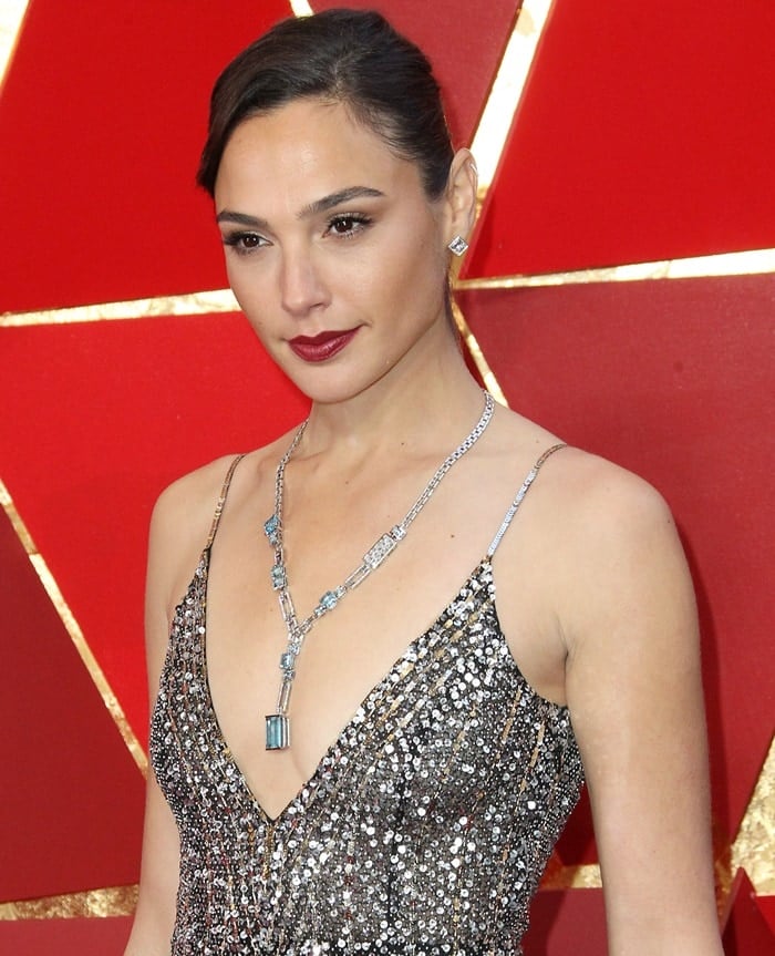Gal Gadot wearing a silver and blue diamond statement Tiffany Co. necklace