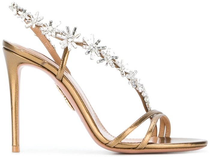 Luxury Italian footwear brand Aquazzura is famed for its exquisite and glamorous designs, as showcased by these stunning gold-tone Chateau 105 sandals