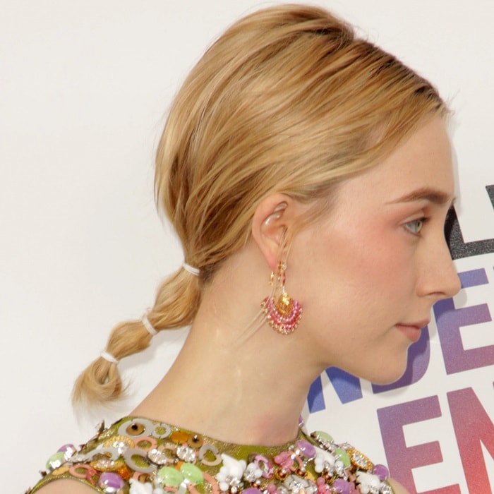 Saoirse Ronan wearing Piaget 'Sunny Side of Life' High Jewelry earrings