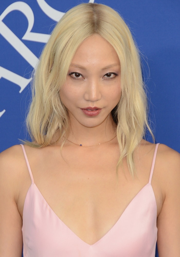 Soo Joo Park in a pink Frame dress at the 2018 CFDA Fashion Awards held at the Brooklyn Museum in New York City on June 4, 2018