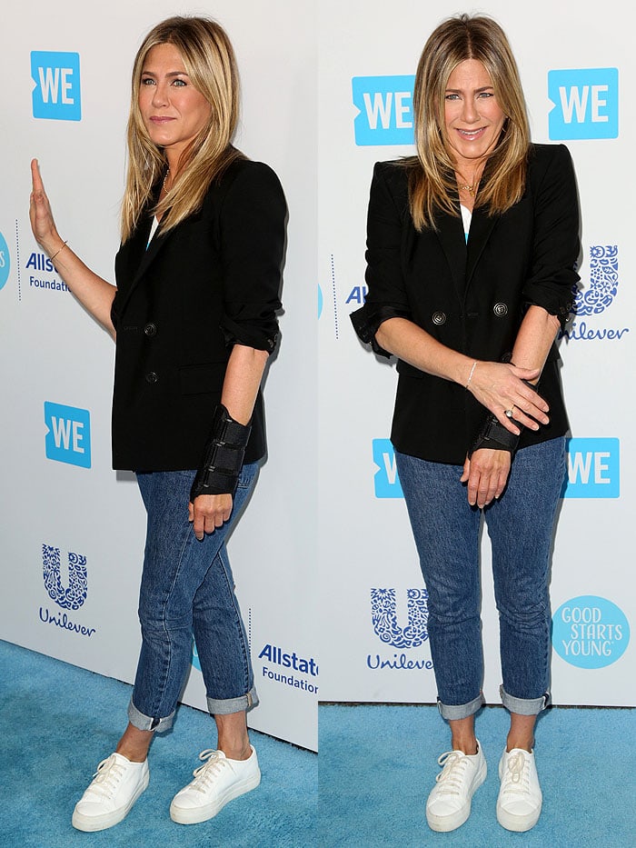 Jennifer Aniston looked to be in good spirits despite her hand injury