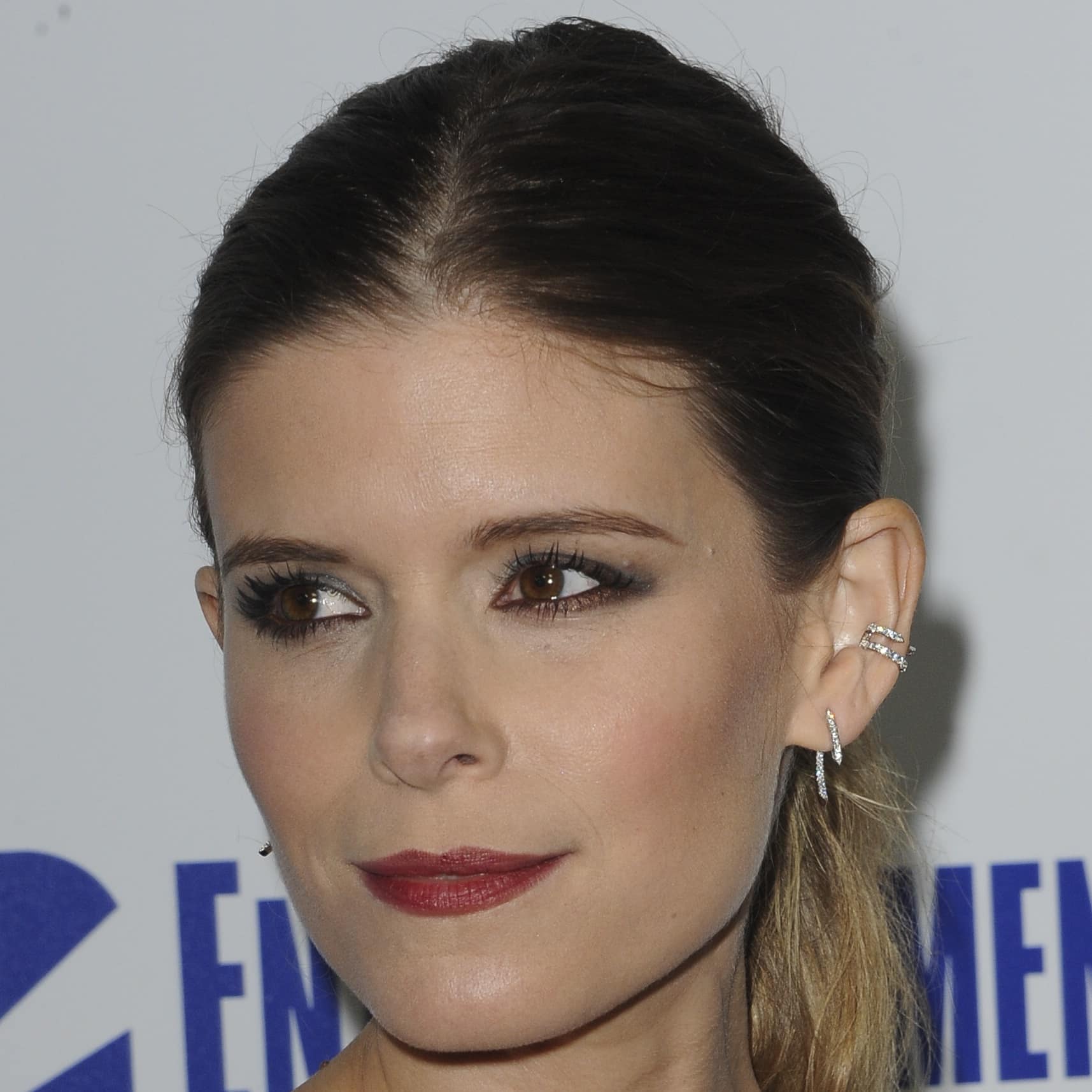 Kate Mara wearing Jennifer Fisher's bestselling diamond-encrusted hoop and ear cuff earrings