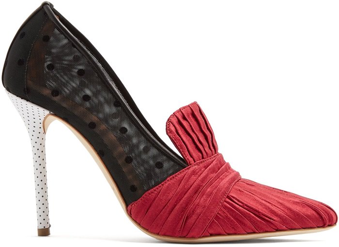 These shoes feature black polka dot-flecked mesh side panels and a high stiletto heel