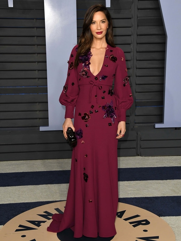 Olivia Munn's burgundy Andrew Gn Pre-Fall 2018 dress