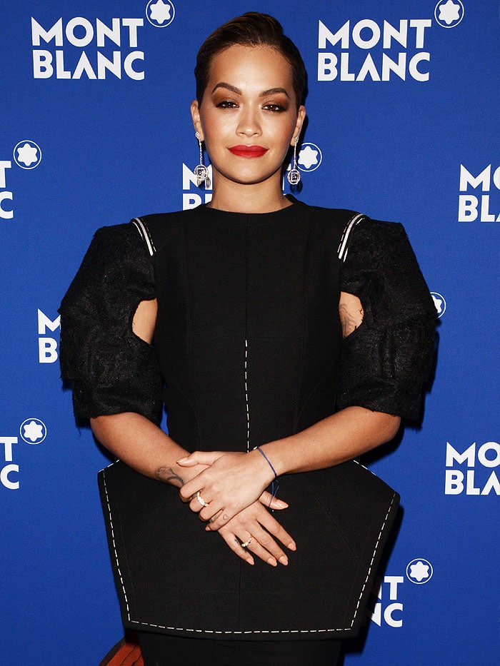 Rita Ora wearing a Vera Wang Fall 2018 structured dress.